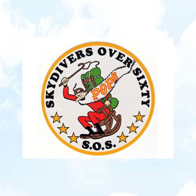 Logo for "Skydivers Over Sixty (SOS)" shows Santa Claus with a parachute, holding a candy cane, riding a sleigh. The word "POPS" is on the parachute. Surrounded by stars, set against a sky-themed background.